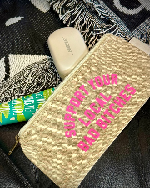 Bad Bitches travel pouch, jute and cotton zippered pouch with "support your local bad bitches" printed in hot pink ink sold, designed, and printed by Le Monkey House