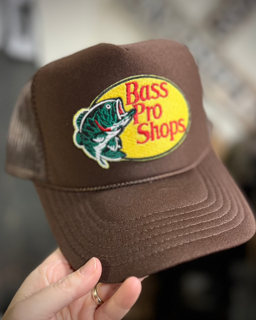 Bass Pro Shops Brown foam and mesh trucker hat with embroidered patch sold by Le Monkey House