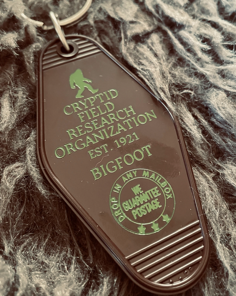 Cryptid Field research bigfoot vintage retro motel plastic keychain by 3 Sisters sold by Le Monkey House