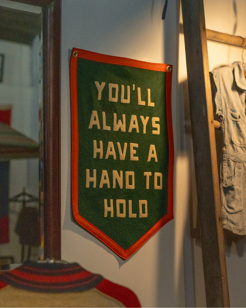 You'll always have a hand to hold Bill Strings camp flag by Oxford Pennant sold by Le Monkey House