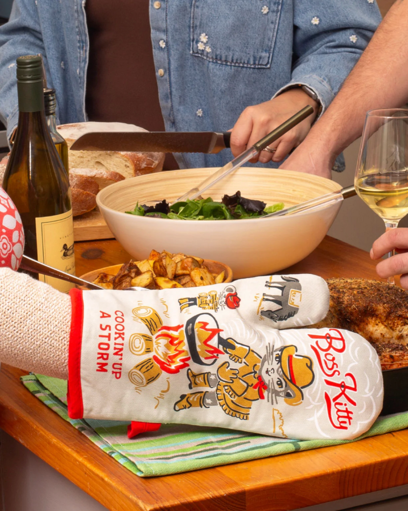 Whether it's your first rodeo, or your hundredth, y'all don't wanna burn those paws! Boss Kitty Oven Mitt by Blue Q sold by Le Monkey House