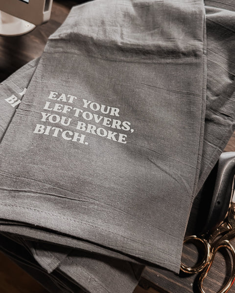 Eat your left overs, you broke bitch tea towel designed printed and sold by Le Monkey House