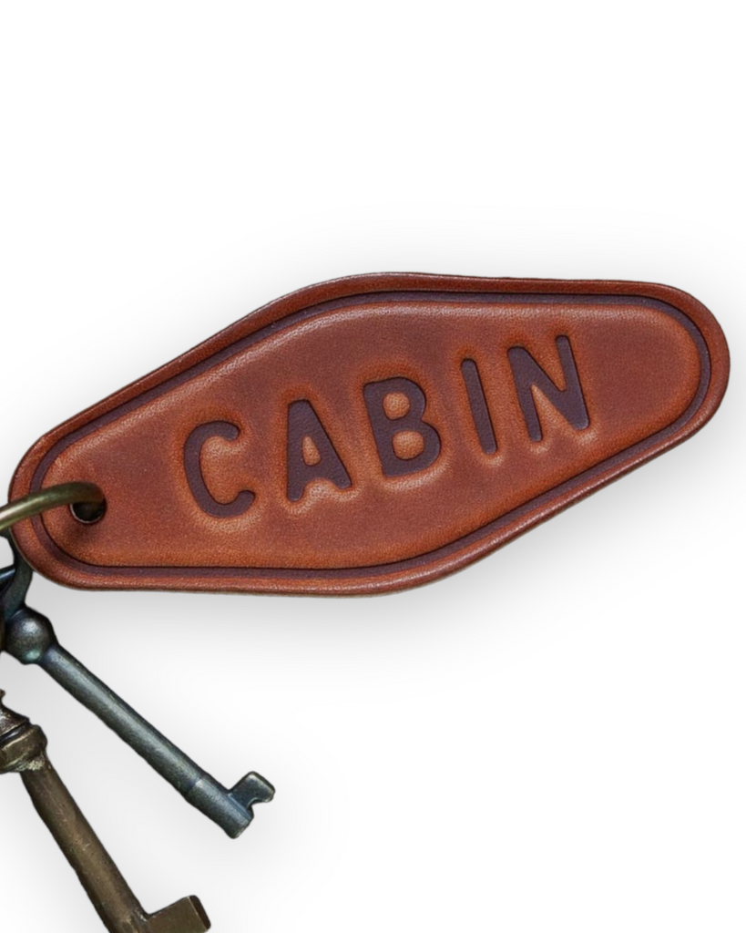 Cabin round leather keychain by Sugarhouse Leather Sold by Le Monkey House