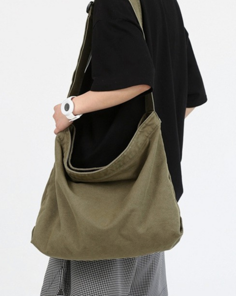 Canvas crossbody bag in olive green sold by Le Monkey House, Culpeper, Virginia