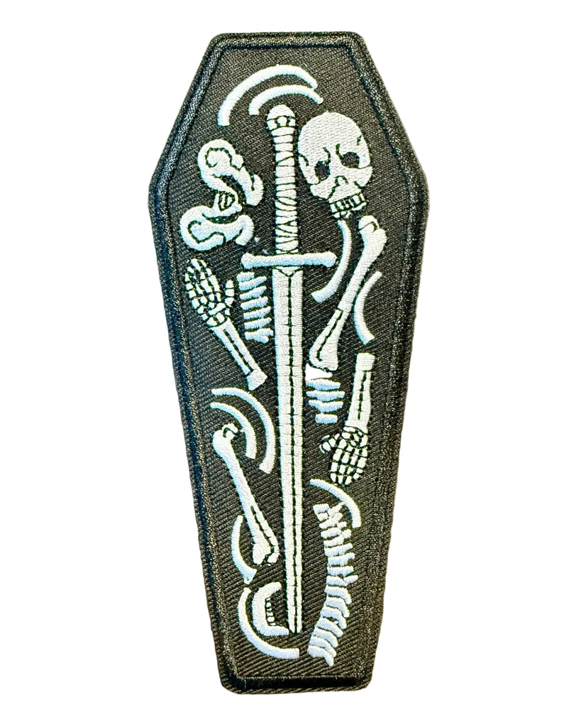 Coffin with bones and sword embroidered iron on patch sold by Le Monkey House