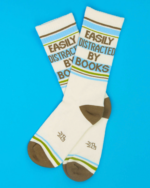 Easily distracted by Books retro gym socks by Gumball Poodle sold by Le Monkey House
