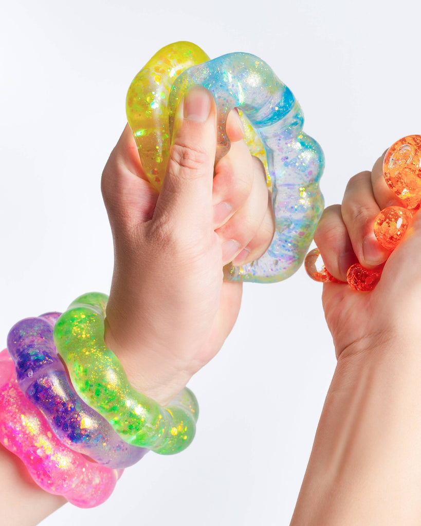 Glitter squishy bracelets, wearable squishies, sold by Le Monkey house
