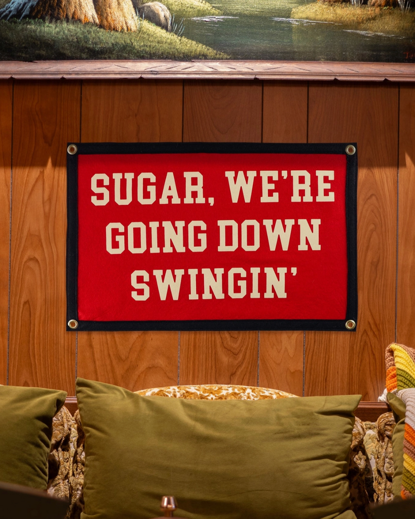 Sugar, we're going down swinging camp flag, by Oxford Pennant, sold by Le Monkey House