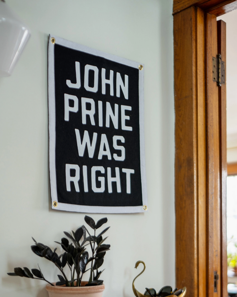 John Prine was right camp flag by Oxford pennant sold by Le Monkey House