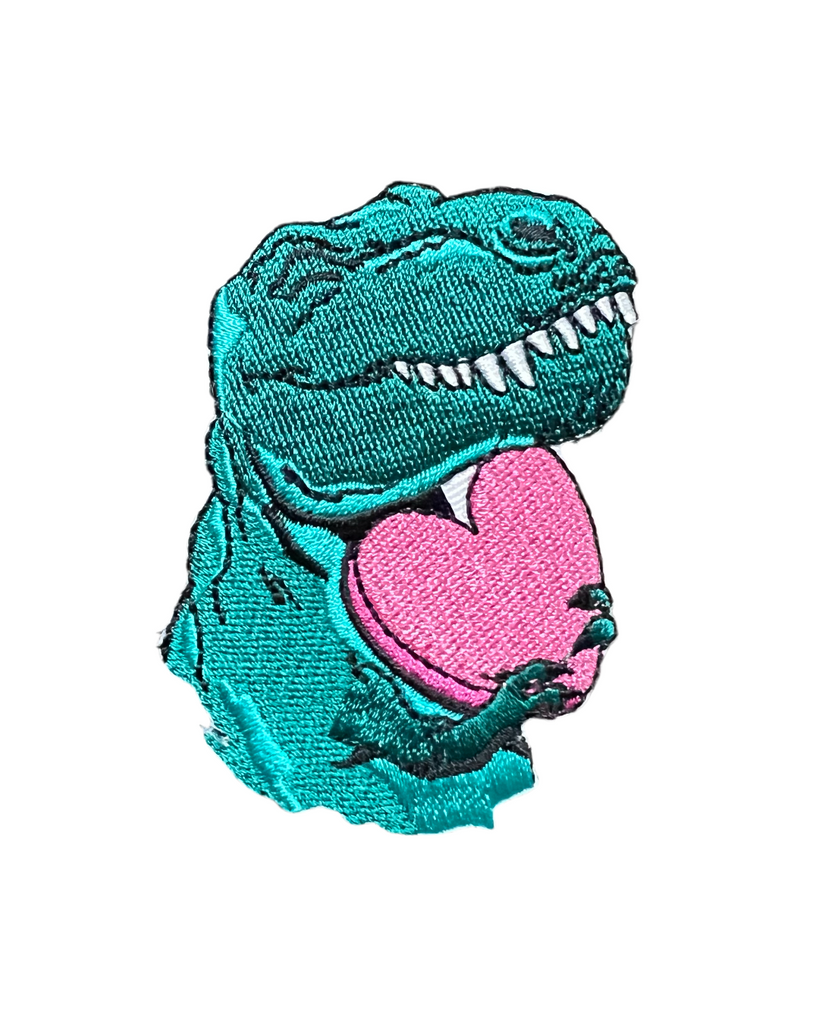 Dinosaur with heart embroidered iron on patch sold by Le Monkey House