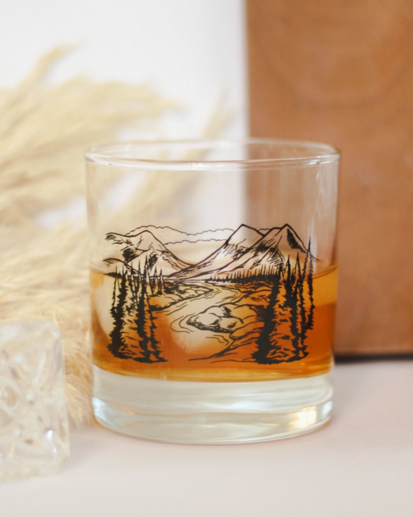 Mountains and trees black ink whiskey rocks glass by Counter Couture sold by Le Monkey House