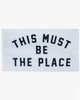 This must be the place outdoor flag, by Oxford Pennant, sold by Le Monkey House