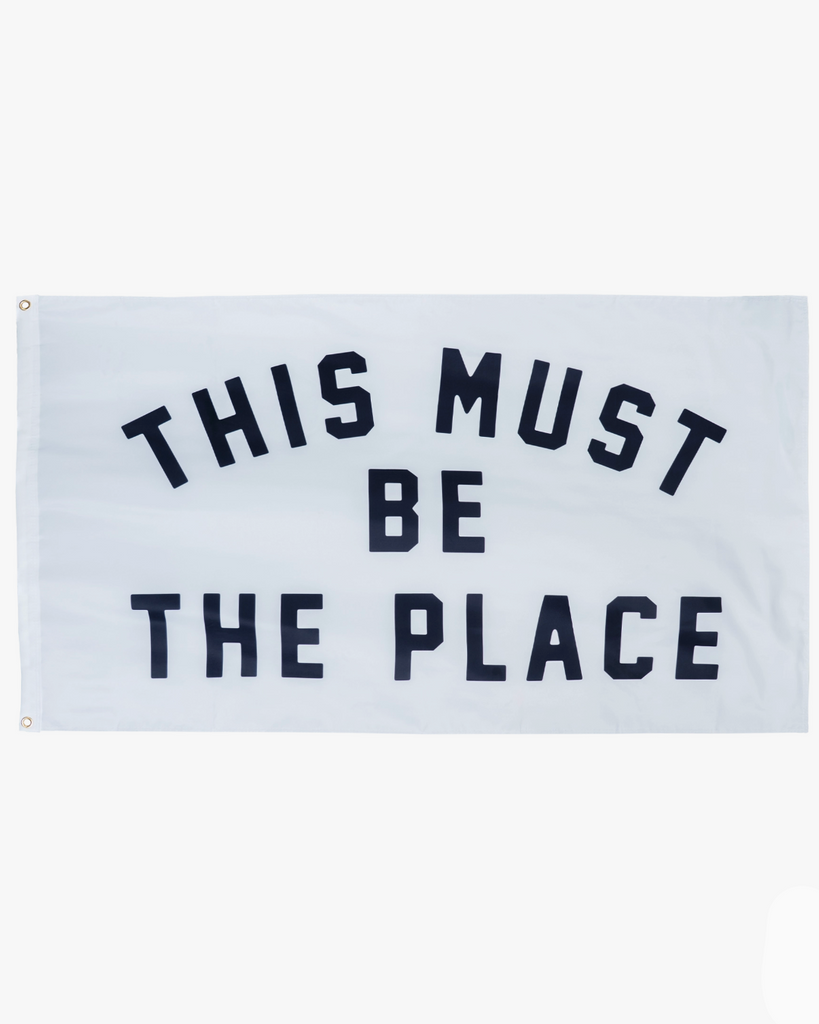 This must be the place outdoor flag, by Oxford Pennant, sold by Le Monkey House