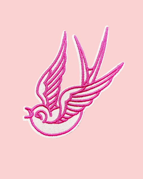 Pink embroidered swallow iron on patch sold by Le Monkey House