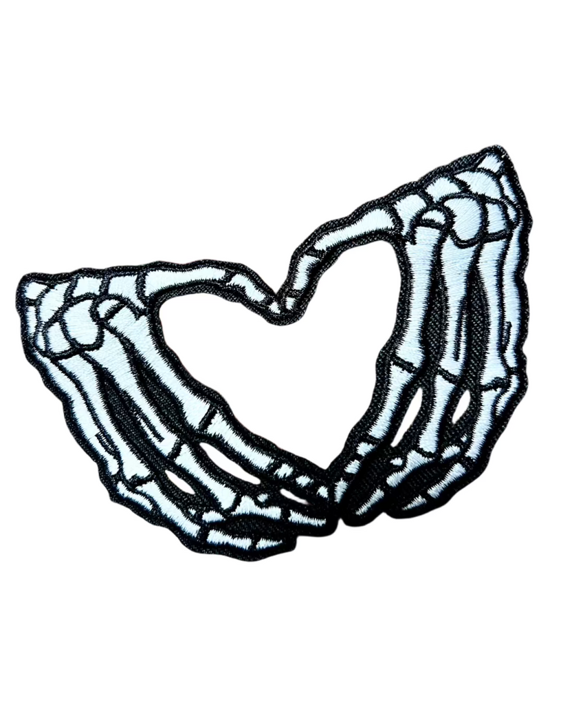 Skeleton Heart Hands Large black and white embroidered iron on patch sold by Le Monkey House