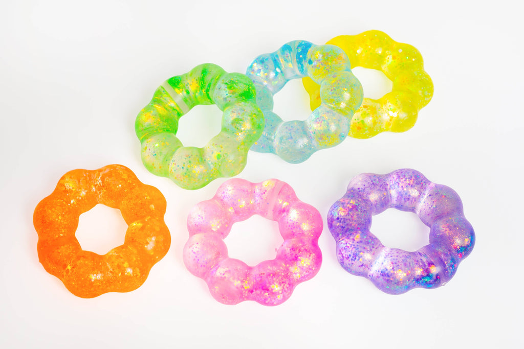Glitter squishy bracelets, wearable squishies, sold by Le Monkey house