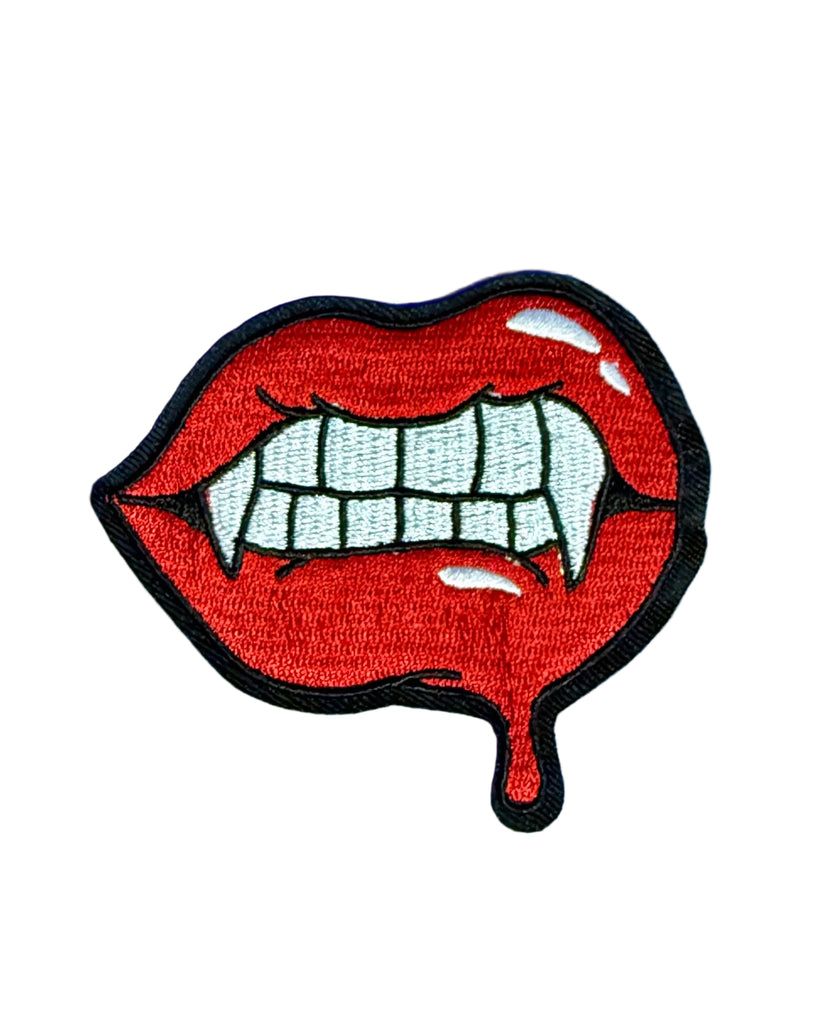 red white and black with blood drip vampire mouth and teeth iron on patch sold by Le Monkey House