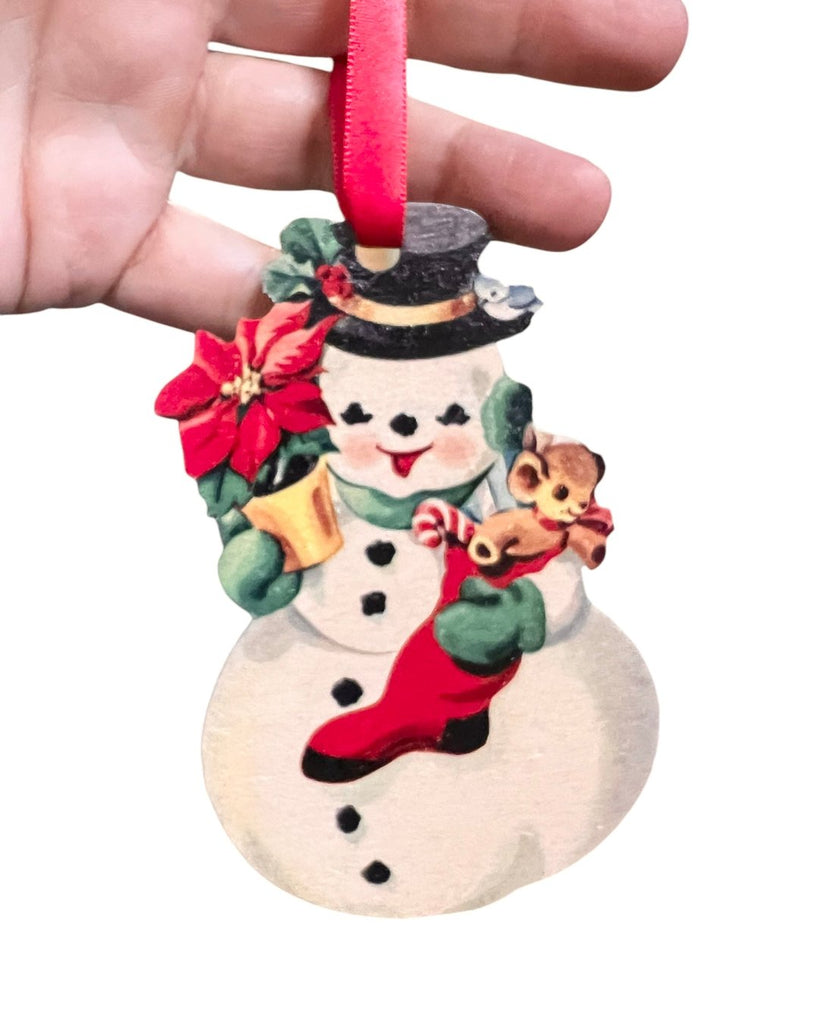 Vintage style wooden snowman ornament sold by Le Monkey House