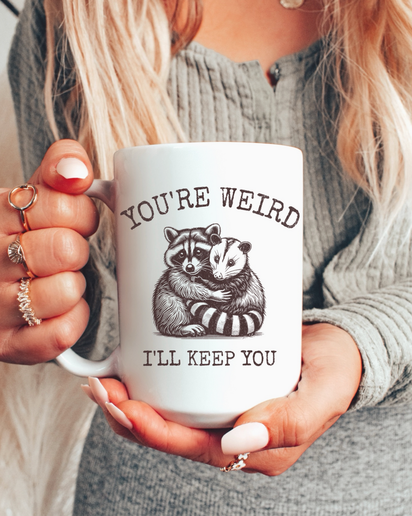 You're weird I'll keep you coffee mug by Ace the pitmatian sold by Le Monkey House