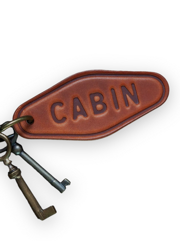 Cabin round leather keychain by Sugarhouse Leather Sold by Le Monkey House