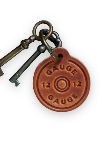 12 Gauge Shell round leather keychain by Sugarhouse Leather Sold by Le Monkey House
