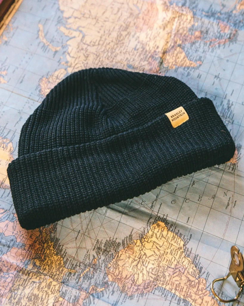 Black wool watch cap by Bradley Mountain sold by Le Monkey House