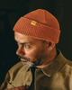 Burnt orange watch cap by Bradley Mountain sold by Le Monkey House