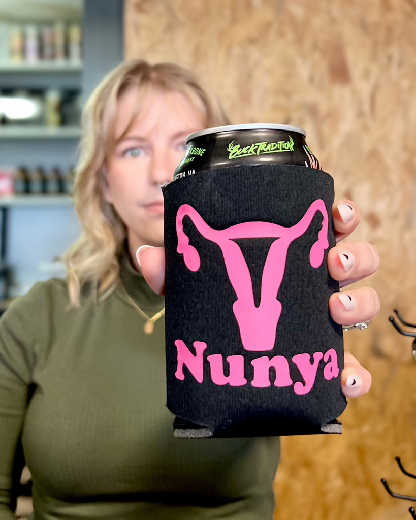 Nunya black and pink koozie printed, designed and sold by Le Monkey House