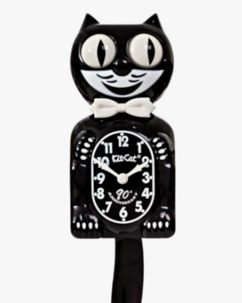 A black and white Kit-Cat Klock with an analog dial and rolling eyes.