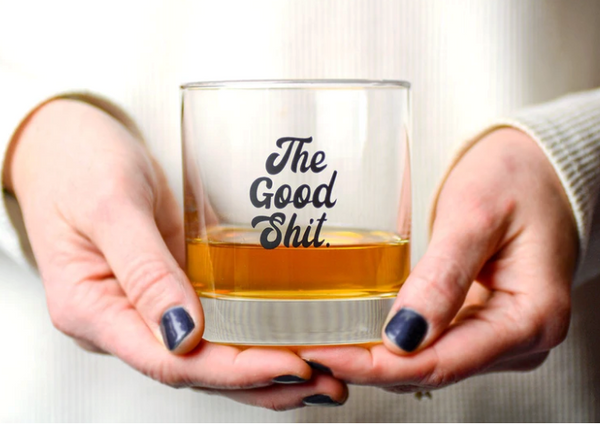 The Good Shit Whiskey Rocks Glass by Meriwether 1976, Black screenprinted lettering, bourbon glass, sold by Le Monkey House